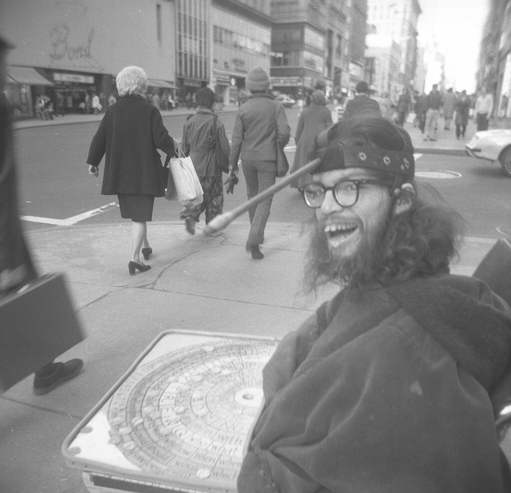 Frank Moore panhandling in front of Altman’s department store, New York, USA early 1970s PHOTO unknown