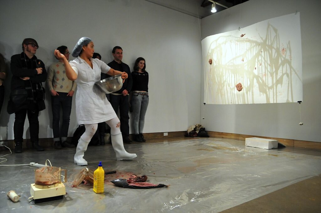 Chuyia Chia performing Who is the predator and prey? at XPACE Cultural Centre