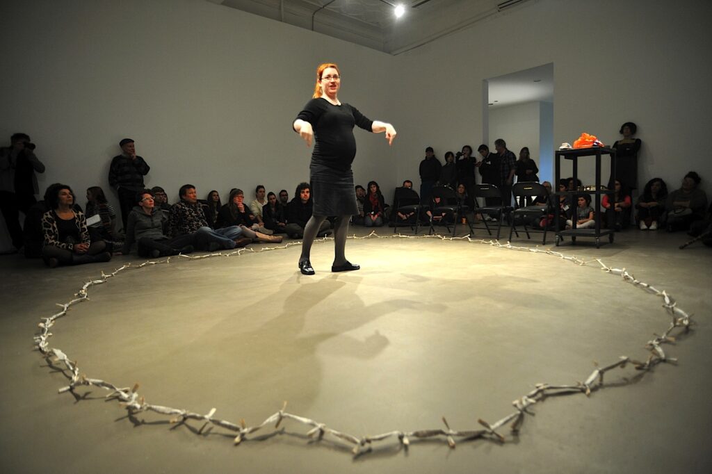 Jolanta Lapiak performing De-Hearingization at Mercer Union