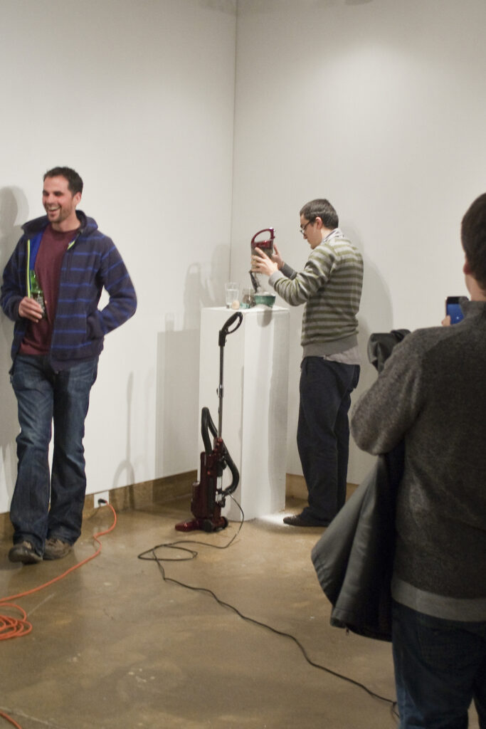 Julian Higuerey Núñez presenting the conditions of surrender at XPACE Cultural Centre