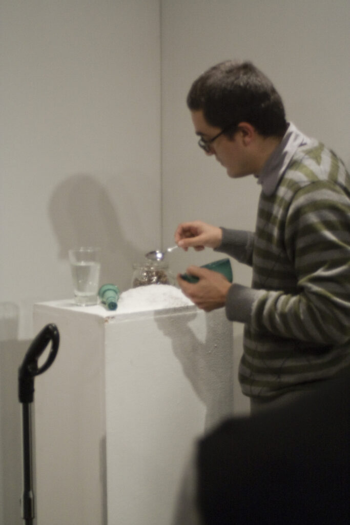 Julian Higuerey Núñez presenting the conditions of surrender at XPACE Cultural Centre