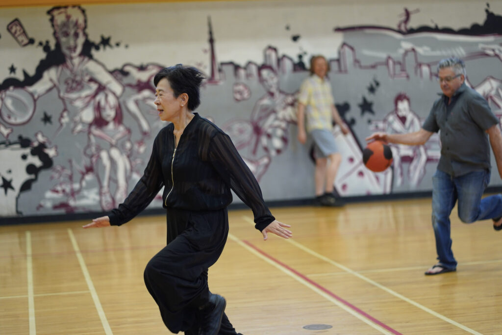 Sakiko Yamaoka and audience participant perform Body Maintenance as part of KinesTHESES, 2019
