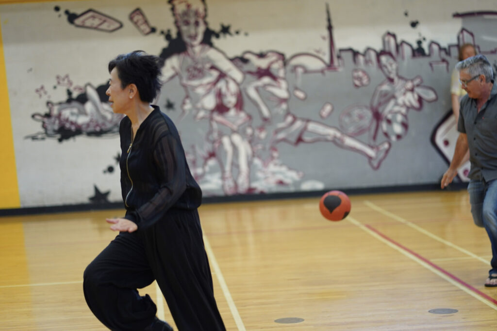 Sakiko Yamaoka and audience participant perform Body Maintenance as part of KinesTHESES, 2019