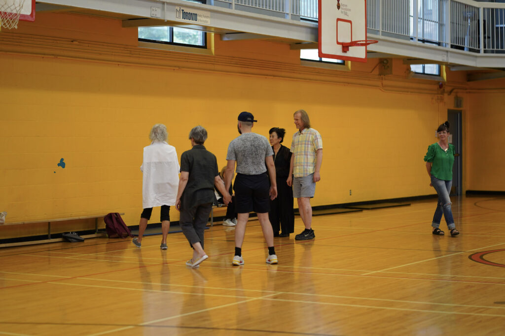 Sakiko Yamaoka and audience participants perform Body Maintenance as part of KinesTHESES, 2019