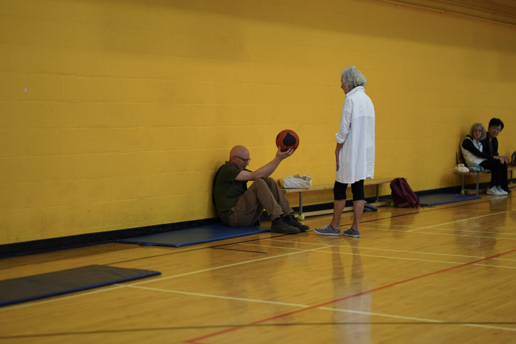 audience participants perform Body Maintenance as part of KinesTHESES, 2019