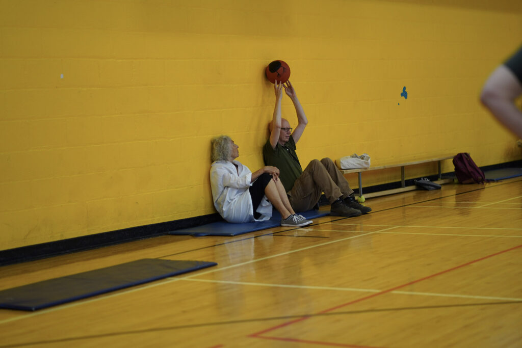 audience participants perform Body Maintenance as part of KinesTHESES, 2019