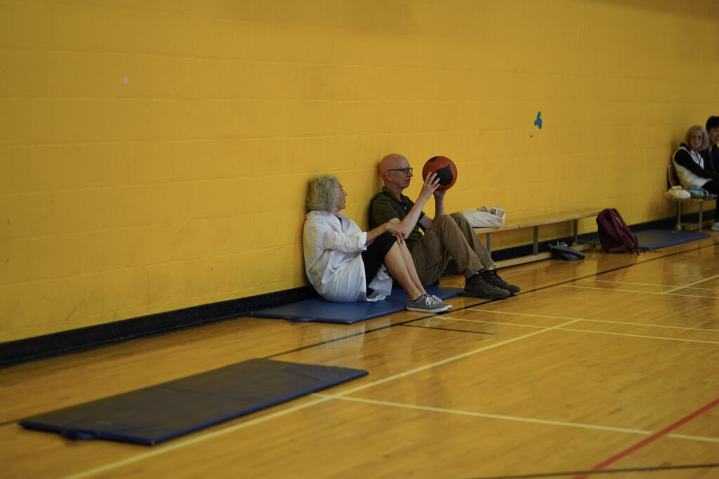 audience participants perform Body Maintenance as part of KinesTHESES, 2019
