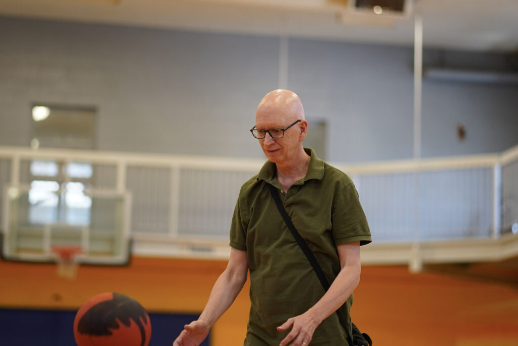 audience participant performs Body Maintenance as part of KinesTHESES, 2019