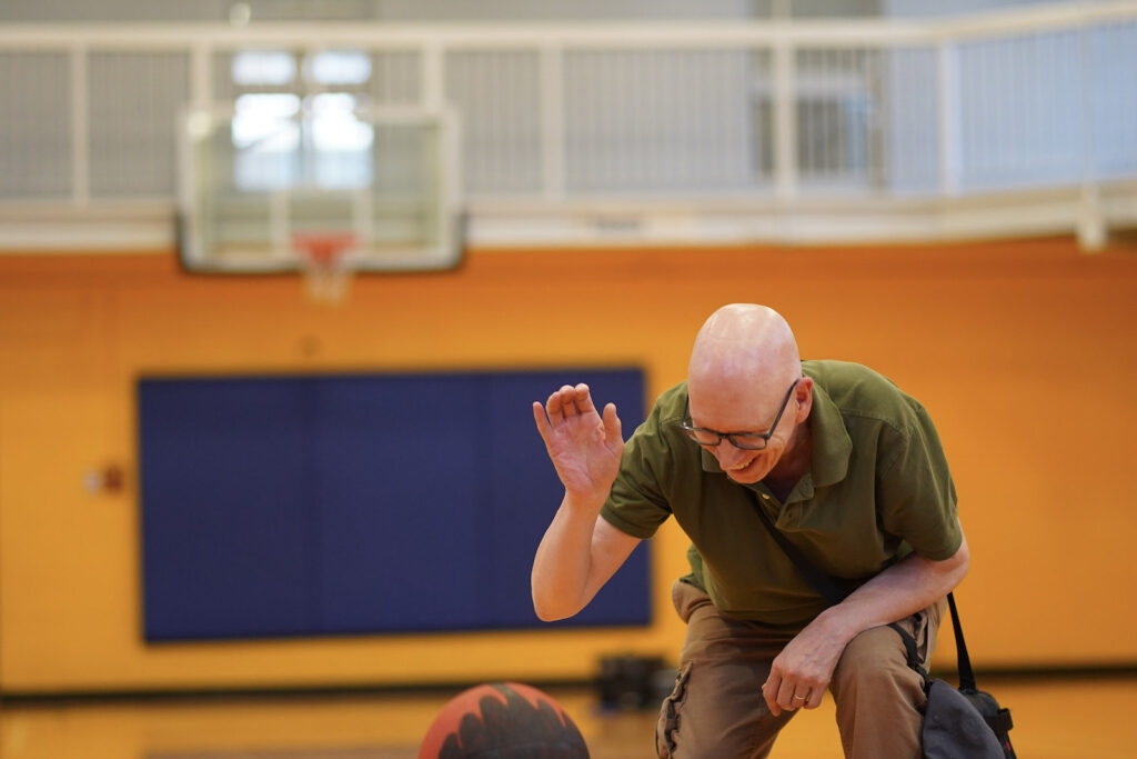 audience participant performs Body Maintenance as part of KinesTHESES, 2019