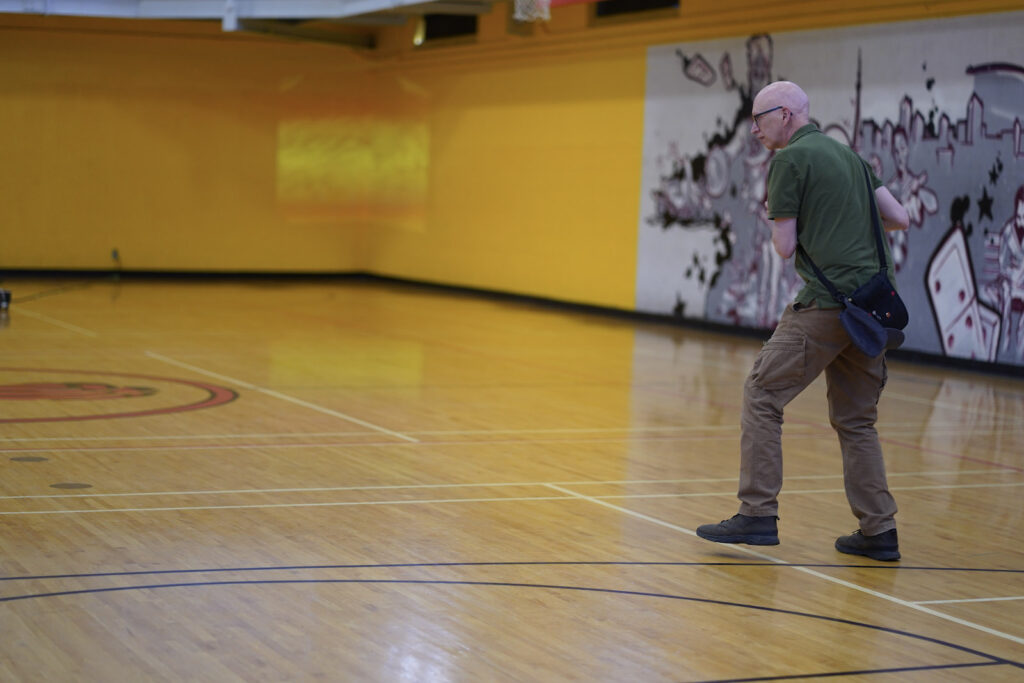 audience participant performs Body Maintenance as part of KinesTHESES, 2019