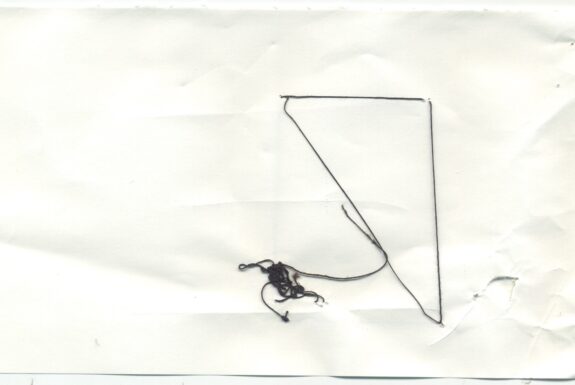 Notebook page from Step 2 (reverse side with black thread)