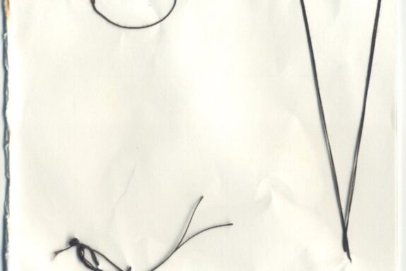 Notebook page from Step 2 (reverse side with black thread)