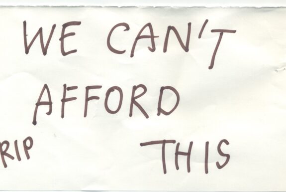 Notebook page from Step 2 with the words 'We can't afford RIP this' in thick black marker