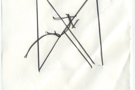 Notebook page from Step 2 (reverse side with black thread)