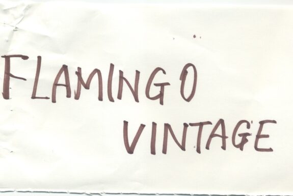 Notebook page from Step 2 with the words 'Flamingo vintage' in thick black marker