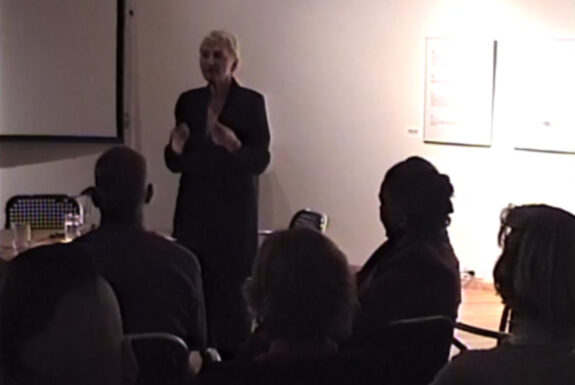 Slavka Sverakova delivering her lecture "Performance Art in Ireland, 1975-1998" at Some Assembly Required, 7a*11d 1998
