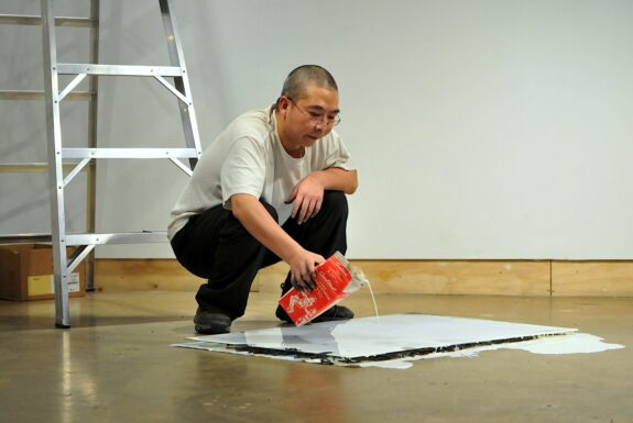 Chen Jin performing ‘Point at the world’ at XPACE.