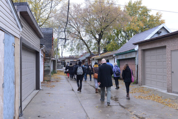 Camille Turner perfoming In a Toronto laneway