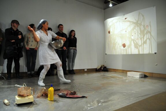 Chuyia Chia performing Who is the predator and prey? at XPACE Cultural Centre