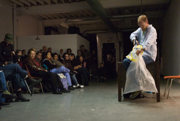 Ed Johnson performing Inquisitive/Inquisitor at XPACE Cultural Centre