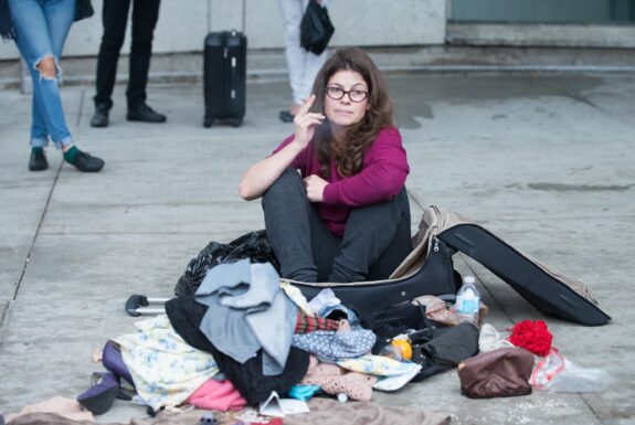 Tanja Ostojić performing Misplaced Women? at the corner of Dundas St W & McCaul