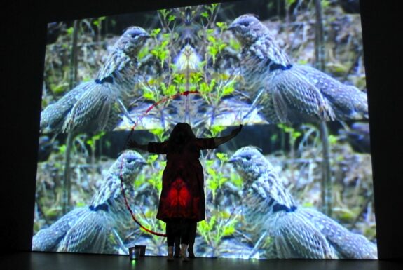 Robin Brass performing ‘Mi Imā Ēhkosit’ at XPACE.